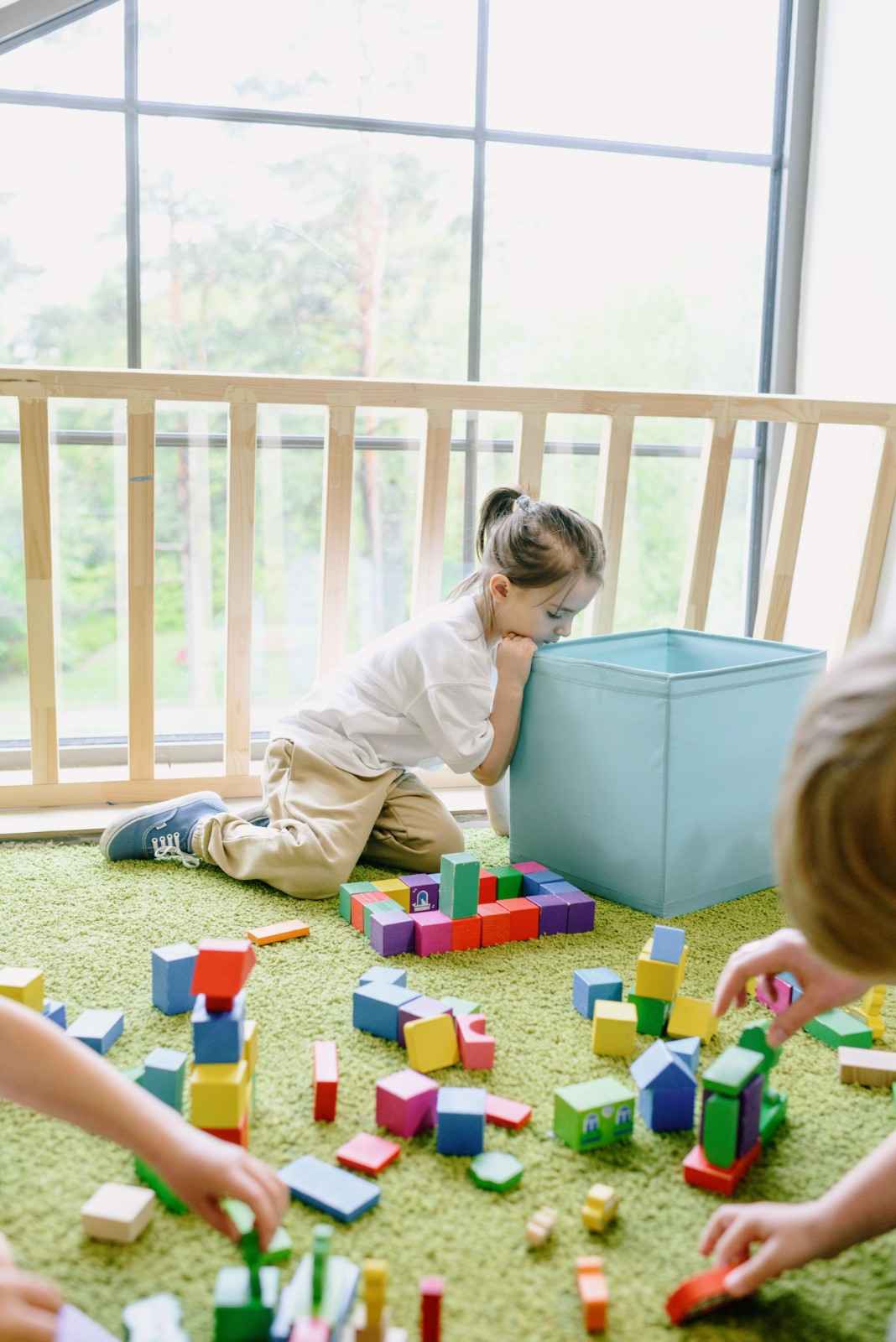Therapist supporting a child during therapy